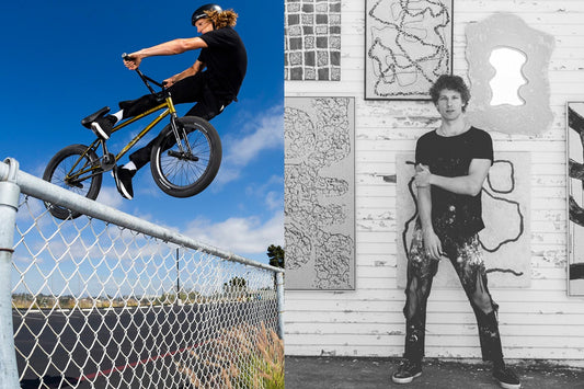 Action shot of Pro BMX rider doing a trick twisting bike and body backwards over a chain link fence