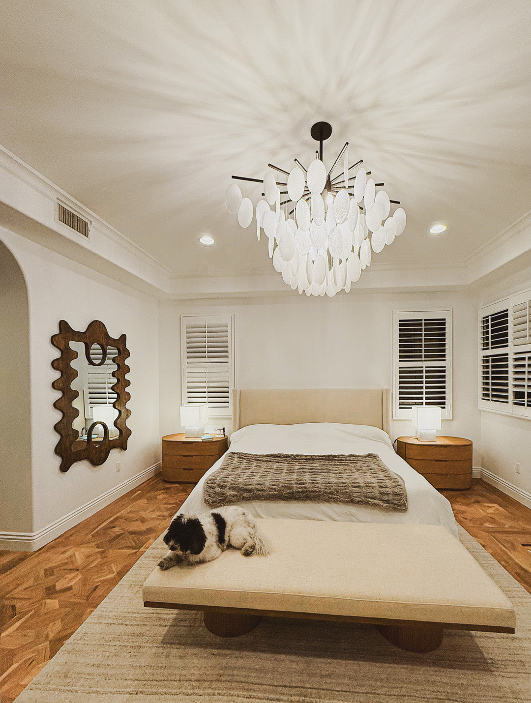 Statement mirror artwork integrated into modern home setting