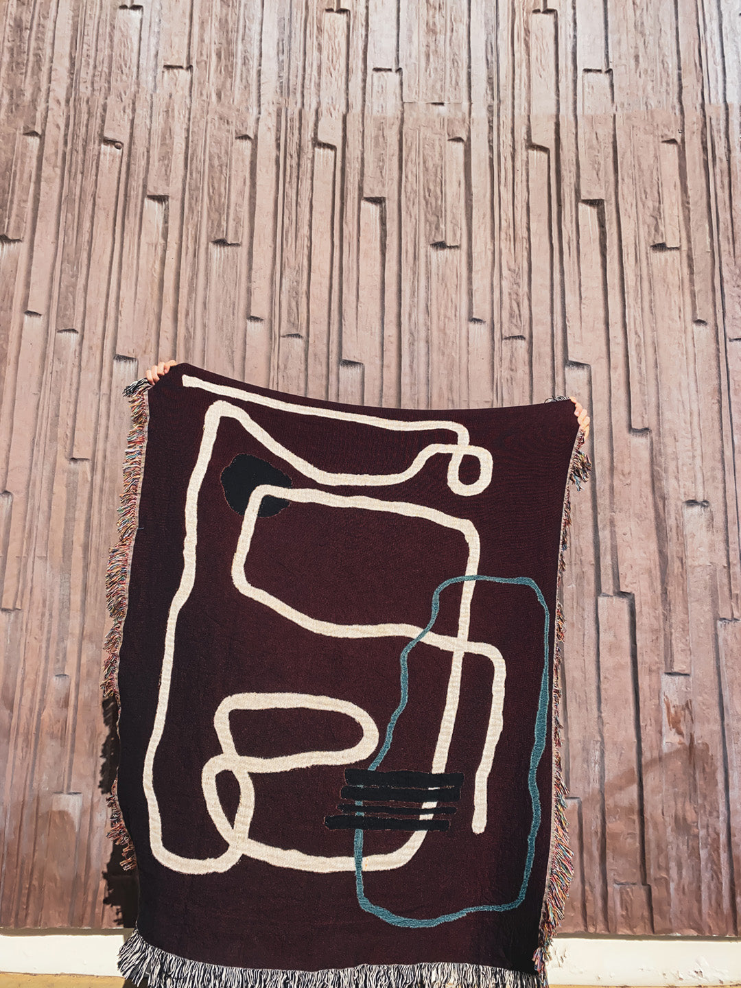 Handcrafted abstract art blanket with organic color palette